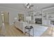 Inviting living room with fireplace, built-in shelving and lots of natural light at 112 Windalier Rdg, Peachtree City, GA 30269