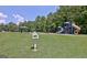 Community playground and lending library are located on a large manicured lawn at 112 Windalier Rdg, Peachtree City, GA 30269