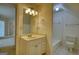 Bathroom with single sink vanity, white cabinets, and tile flooring at 1880 Hickory Station Cir, Snellville, GA 30078