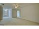 This spacious bedroom has neutral carpet and a window, providing comfort and natural light at 1880 Hickory Station Cir, Snellville, GA 30078