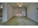 An empty bonus room with neutral carpet, offering versatility for various uses at 1880 Hickory Station Cir, Snellville, GA 30078