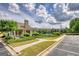 Picturesque view of a community clubhouse, pool, and well-maintained landscaping creating a resort-like atmosphere at 1880 Hickory Station Cir, Snellville, GA 30078