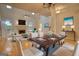 Living room features a fireplace, hardwood floors, seating and a dining space at 1880 Hickory Station Cir, Snellville, GA 30078