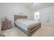 Bright bedroom with a cozy bed, soft carpet, and a view to the Primary bath at 2022 Maple Ridge, Acworth, GA 30101
