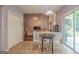 Cozy dining area with view into the living room and sliding doors to the backyard at 2022 Maple Ridge, Acworth, GA 30101