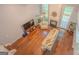 Bright, open living room features hardwood floors, a fireplace, and a vaulted ceiling at 2022 Maple Ridge, Acworth, GA 30101