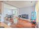 Bright living room with hardwood floors, a dining table, and elegant accents and decor at 2022 Maple Ridge, Acworth, GA 30101