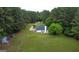 Aerial view of the home on the property with large yard space at 391 Massengale Rd, Brooks, GA 30205