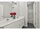 Bright bathroom features a double sink vanity, stylish fixtures, and a shower/tub combination at 391 Massengale Rd, Brooks, GA 30205