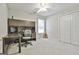 Cozy bedroom with built-in desk, plenty of storage, and natural light from the window at 391 Massengale Rd, Brooks, GA 30205