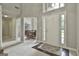 Inviting foyer showcasing natural light, high ceilings, and dining room at 391 Massengale Rd, Brooks, GA 30205