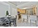 Cozy kitchen and breakfast nook with stainless steel appliances and bar seating at 391 Massengale Rd, Brooks, GA 30205