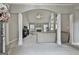 Spacious living room featuring vaulted ceilings, fireplace, and neutral decor at 391 Massengale Rd, Brooks, GA 30205