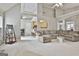 Spacious living room offering seamless connection to kitchen and breakfast nook at 391 Massengale Rd, Brooks, GA 30205