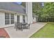 Outdoor patio with an elegant table set, perfect for outdoor entertaining and relaxation at 391 Massengale Rd, Brooks, GA 30205