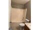 Bathroom featuring a shower-tub combo, vanity with a sink, and a toilet at 851 Walkingstick Dr, Douglasville, GA 30134