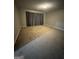 This empty bedroom features neutral paint and carpet, offering a blank canvas for design at 851 Walkingstick Dr, Douglasville, GA 30134