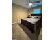 Cozy bedroom featuring carpet flooring, a ceiling fan, and a queen sized bed at 851 Walkingstick Dr, Douglasville, GA 30134