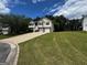 Lovely two-story home with a well-manicured lawn and a two-car garage at 851 Walkingstick Dr, Douglasville, GA 30134