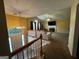 Open-concept living room featuring a fireplace, vaulted ceilings, and lots of natural light at 851 Walkingstick Dr, Douglasville, GA 30134