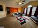 Bright living room with vaulted ceilings, a modern rug, and comfortable seating at 851 Walkingstick Dr, Douglasville, GA 30134