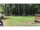 Expansive backyard featuring lush lawn and mature trees, perfect for outdoor activities and relaxation at 288 Harper Se Rd, Atlanta, GA 30315