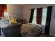 Warm bedroom with lots of natural light and a comfortable queen-sized bed at 288 Harper Se Rd, Atlanta, GA 30315