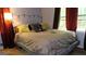 Cozy bedroom showcasing ample natural light, and neutral decor at 288 Harper Se Rd, Atlanta, GA 30315