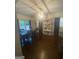 Bright dining room featuring hardwood floors, large windows, and a stylish light fixture at 288 Harper Se Rd, Atlanta, GA 30315