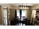 Bright dining room with modern lighting fixture and stylish furnishings at 288 Harper Se Rd, Atlanta, GA 30315