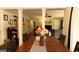 Cozy dining room showcasing a wooden table with a view to the living room at 288 Harper Se Rd, Atlanta, GA 30315