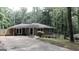 Beautiful brick home with mature trees, offering privacy and curb appeal at 288 Harper Se Rd, Atlanta, GA 30315