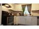 Cozy kitchen with white cabinets, granite countertops, and stainless steel appliances at 288 Harper Se Rd, Atlanta, GA 30315