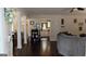 Inviting living room with hardwood floors and an open concept layout leading to the kitchen at 288 Harper Se Rd, Atlanta, GA 30315