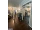View through living spaces with hardwood floors, to dining room and kitchen at 288 Harper Se Rd, Atlanta, GA 30315