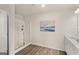 Bathroom featuring a glass shower, modern vanity, and wood-look flooring at 216 Epping Drive, Stockbridge, GA 30281