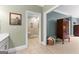 Bathroom showcases tiled floor, shower, and seamless transition to bedroom at 110 Woodland Rd, Fayetteville, GA 30214