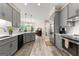 Modern kitchen featuring gray cabinets, white countertops, stainless steel appliances and an island at 110 Woodland Rd, Fayetteville, GA 30214