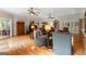 An expansive living room featuring hardwood floors and inviting seating areas at 110 Woodland Rd, Fayetteville, GA 30214