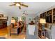 Bright, open living room with hardwood floors, cozy seating, and elegant decor at 110 Woodland Rd, Fayetteville, GA 30214