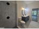 Stylish bathroom with a glass-enclosed shower, a modern vanity with double sinks, and marble countertops at 150 Park Timbers Drive, Sharpsburg, GA 30277