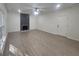 Bright living room features a modern fireplace, ceiling fan, and lots of natural light at 150 Park Timbers Drive, Sharpsburg, GA 30277