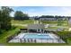 Community pool and clubhouse nestled in the neighborhood and surrounded by green lawns at 256 Epping Dr, Stockbridge, GA 30281