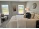Bright bedroom featuring neutral tones, and plush textures for a serene and inviting space at 256 Epping Drive, Stockbridge, GA 30281