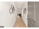 Entryway featuring light colored laminate flooring, light colored walls, and decorative wall art at 256 Epping Drive, Stockbridge, GA 30281