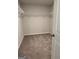 Empty walk-in closet with ample storage space at 256 Epping Drive, Stockbridge, GA 30281