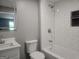 Bright white bathroom with subway tile shower and new fixtures at 367 Frashier Rd, Carrollton, GA 30116
