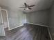Bedroom featuring sleek, neutral floors and a modern ceiling fan at 367 Frashier Rd, Carrollton, GA 30116