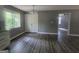 Bright kitchen area boasts new flooring, stainless steel hardware, and natural light from the large window at 367 Frashier Rd, Carrollton, GA 30116