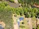 Stunning aerial view of the home nestled amidst lush greenery and serene lakefront property, offering privacy and natural beauty at 637 Lakeview Dr, Newborn, GA 30056